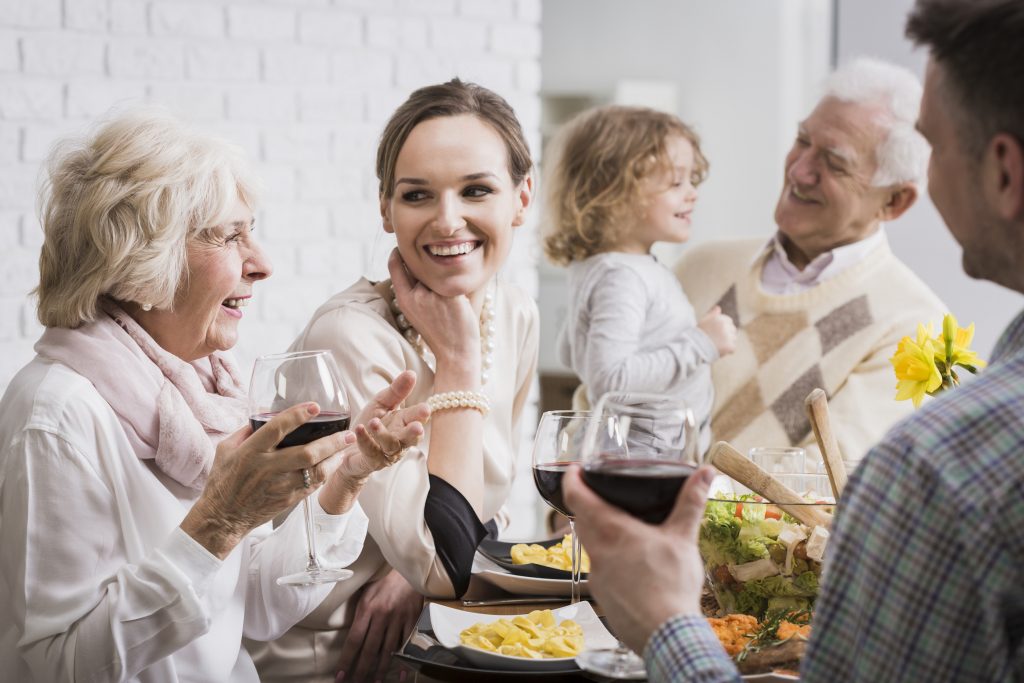 Latitude21 Resorts: Multigenerational Family Trip Having Dinner