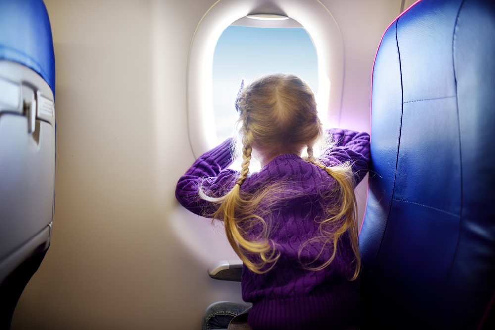 Travel with Toddlers - little girl on the plane